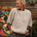 Pull Coraline ficelle