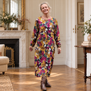 Robe Perrine Brume de grenat dans un appartement parisien
