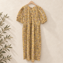 Prototype – Robe longue en coton fleuri – Jaune – XXL – N°058 — fond écru, cintre en bois et branches d’olivier