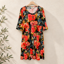 Prototype – Robe – Motif fleuri – S – N°097 — fond écru, cintre en bois et branches d’olivier