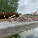 Collier court Avril - dorée/ médaillon noir - Quintessence